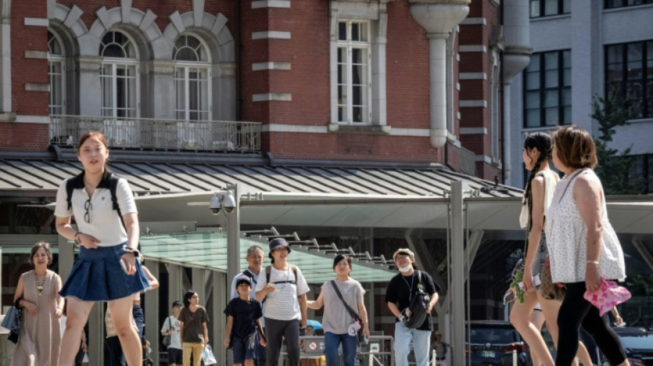 Hot pants: Tokyo government workers swap suits for shorts