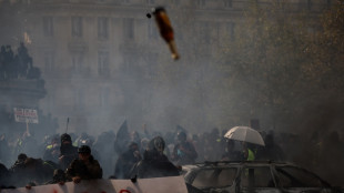 France counts cost of violent protests, 1,800 arrested