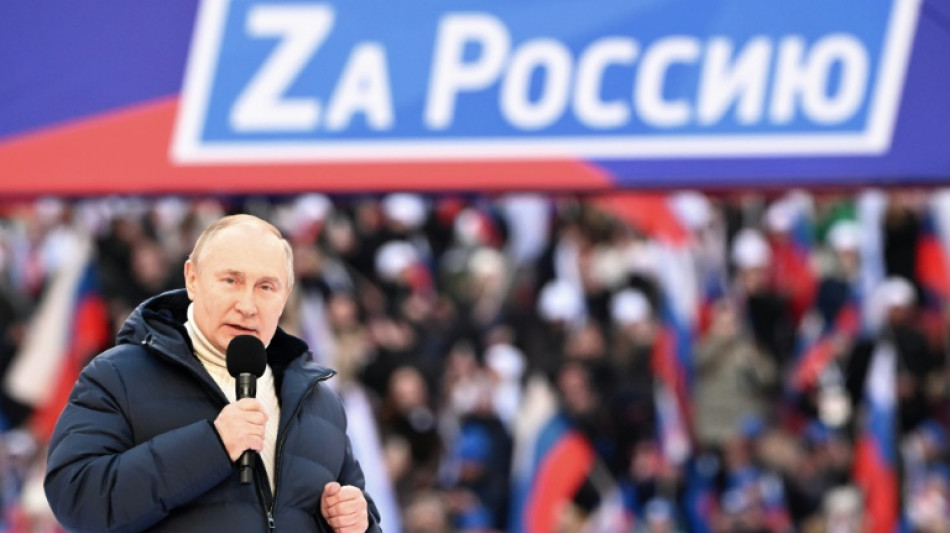 Ukraine: une f&ecirc;te ultra-patriotique &agrave; Moscou et une panne qui interrompt Poutine