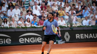 'Resilient' Berrettini powers into French Open last eight