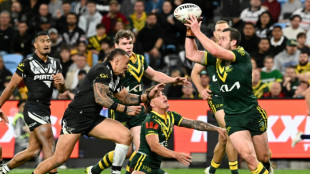 Holders Australia edge New Zealand 24-22 to open Rugby league World Cup
