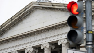 Wall Street stocks rise after bond yield spike eases