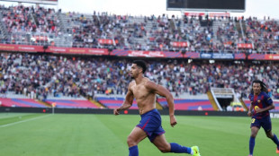Barca claim Liga lead after Araujo's late derby winner