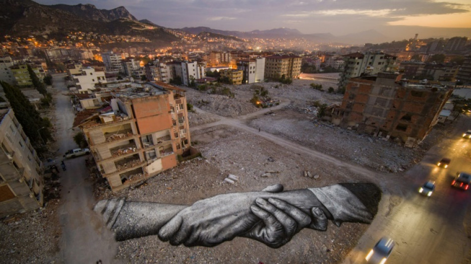 'Working on the rubble': Artist paints on quake-hit Turkey city
