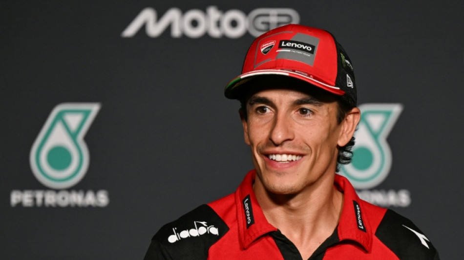 Marquez crashes, then tops second practice in Malaysia
