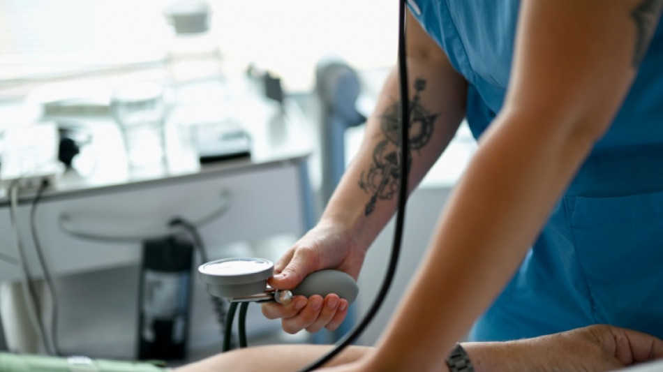 Merz "sehr zufrieden" mit Reformpl&auml;nen zu Krankenversicherung