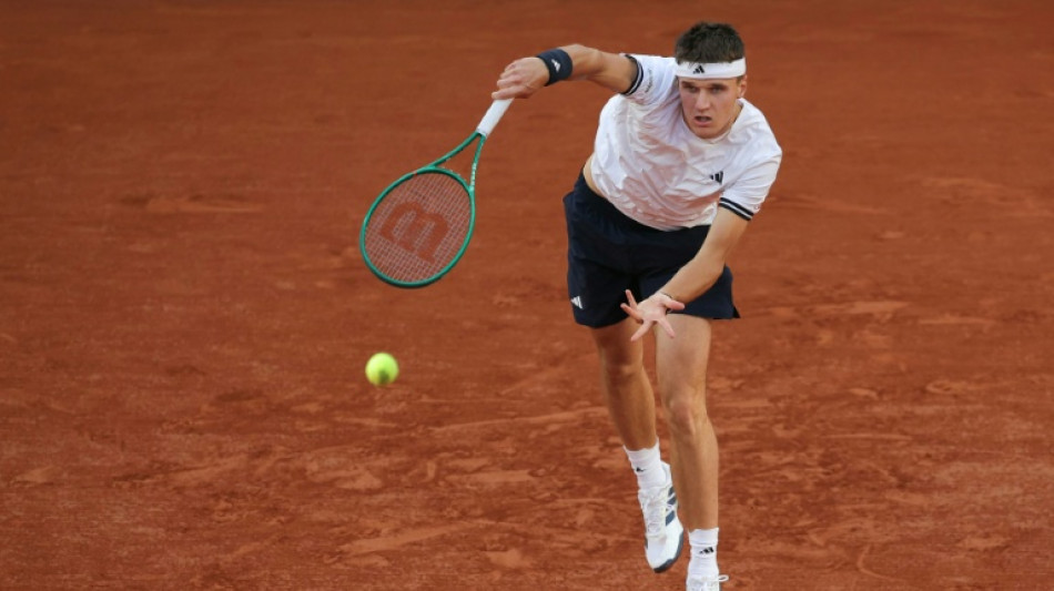 Mensik holds off Rublev to book maiden French Open last-eight spot
