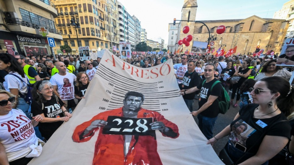 Thousands protest on 1st anniversay of Spain's deadly floods
