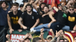 Roma near Champions League return with derby triumph