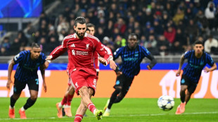 Late penalty drama helps Liverpool defy Salah crisis at angry Inter