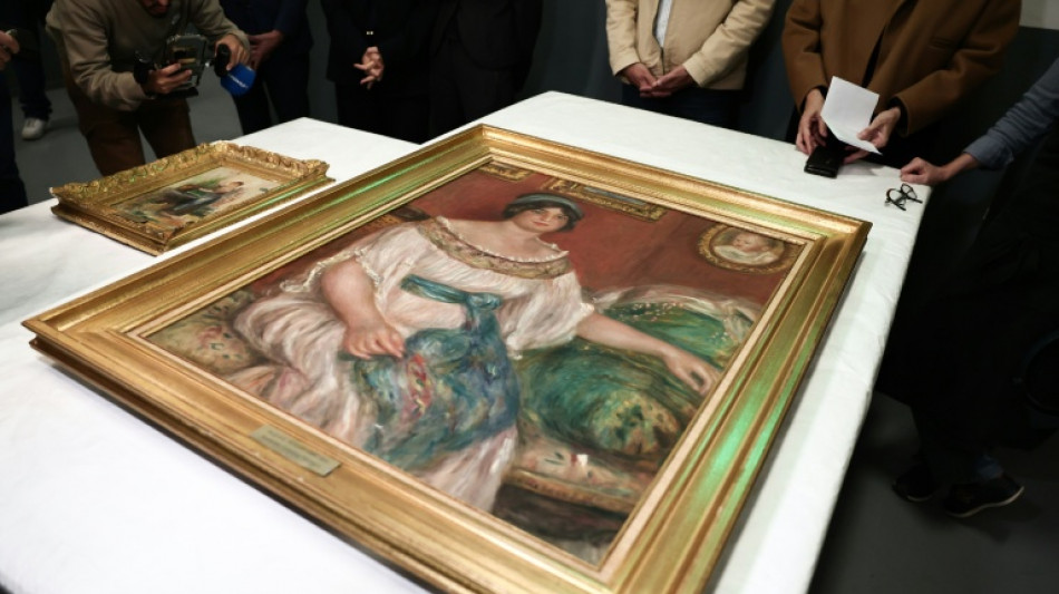 Stolen Renoir paintings found behind wall in France