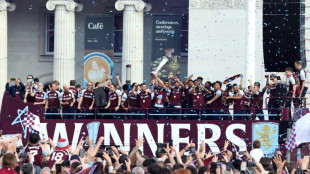 Thousands line streets to celebrate Villa's Europa triumph