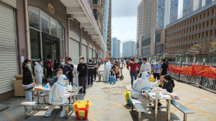 Chine: m&eacute;tropoles confin&eacute;es, usines &agrave; l'arr&ecirc;t &agrave; cause d'une flamb&eacute;e de Covid-19