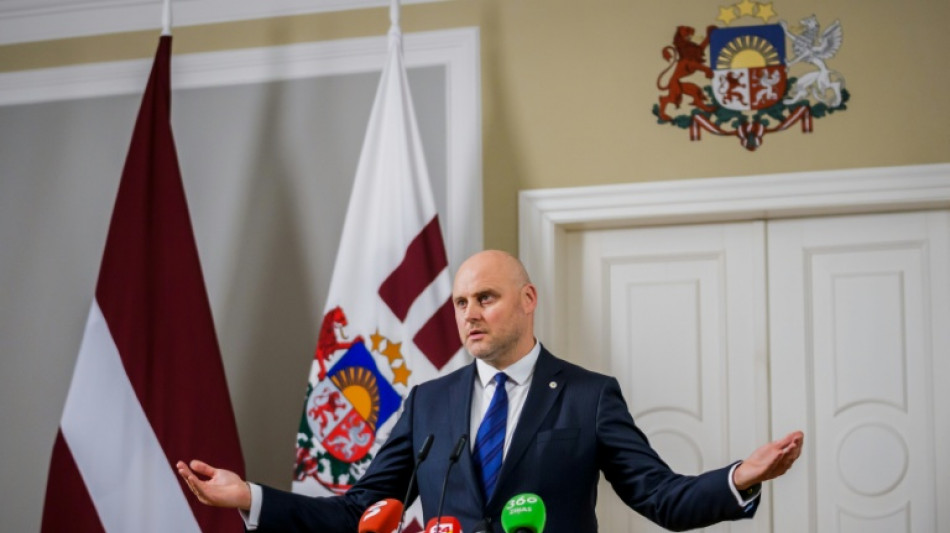 Opposition Latvian lawmaker tapped to form interim government
