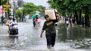 Bali flooding prompts tourist evacuation: official