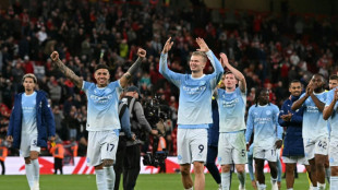 Premier League in limbo as Manchester City soar