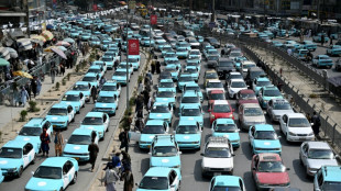 Rebellious Afghan taxi drivers defy ban on music