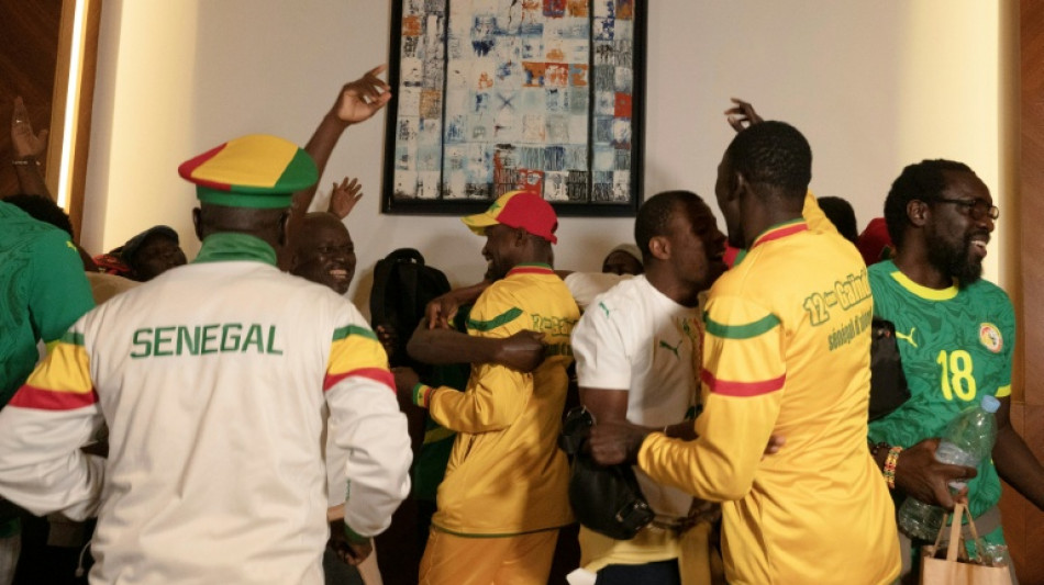 Senegal football fans home after royal pardon