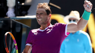 Nadal out for up to six weeks with rib injury